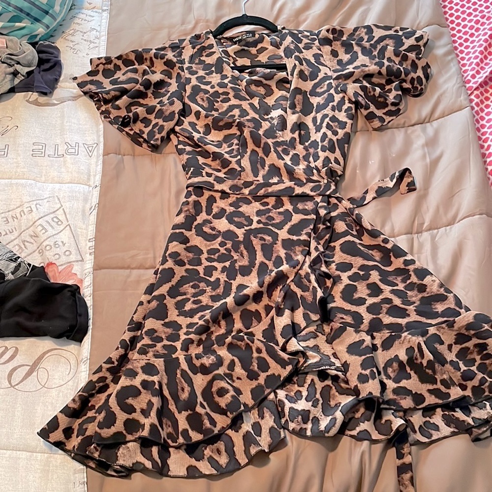 Leopard print self tie mini dress with low cut